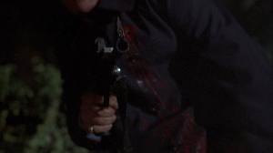 dennis holding the gun